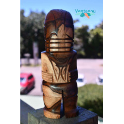 Hand-carved tikis:...