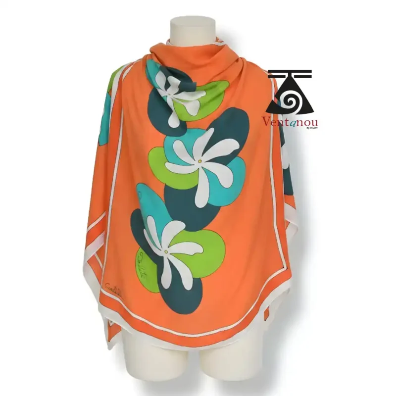 pareo-tahitien-orange-tiare-porte Paréo à fleurs tiare orange porté en robe sur la plage